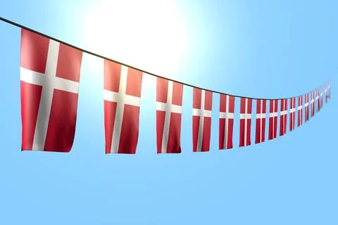 Pretty many Denmark flags or banners hangs diagonal on rope on blue sky Иллюстрация