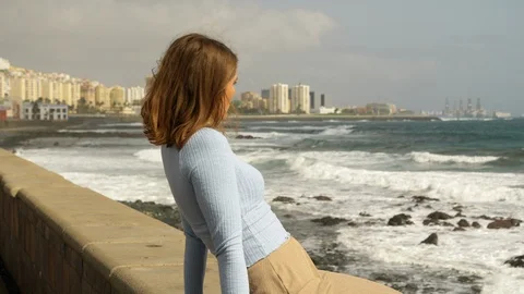 Pretty Model Leaning Back While Sitting Along Beach Video stock 115843647