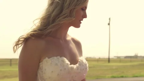 Pretty model posing next to an exotic car Stock Footage 84689389