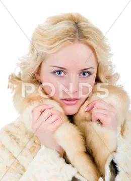 Pretty model wearing fur coat Stock Photos