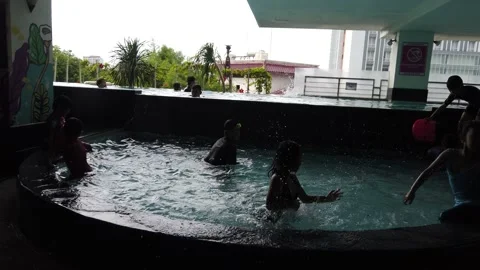 Pretty Multi Ethnic Children Playing Swimming Pool Stock Footage 146716761