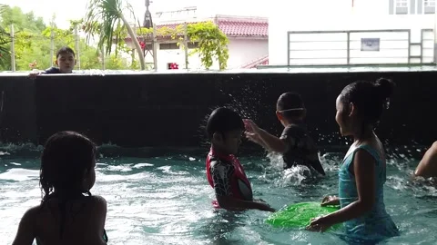 Pretty Multi Ethnic Children Playing Swimming Pool Stock Footage 146716767
