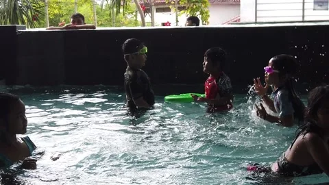 Pretty Multi Ethnic Children Playing Swimming Pool Stock Footage 146716779