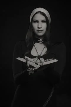 Pretty nun Stock Photos