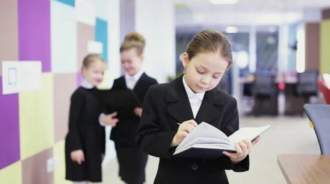 Pretty office kid write Stock Footage 64823043