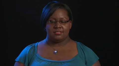 Pretty Plus-sized African Amercian Woman is sad and slumps shoulders Stock Footage 55843865