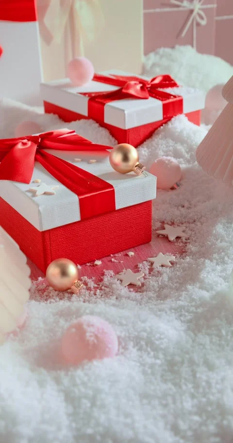 Pretty red festive gift package with ornaments and baubles. Stock Footage 346556539