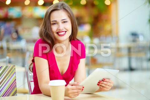 Pretty shopper taking repose, shopping being done Stock Photos