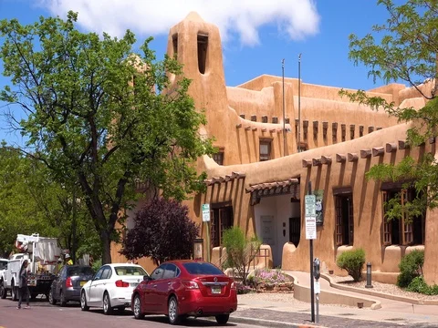 A pretty street scene of an adobe building in Santa Fe, New Mexico. Video stock 79409405