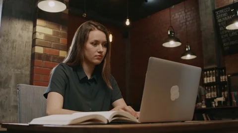 Pretty student with laptop and notepad 스톡 동영상 101471959