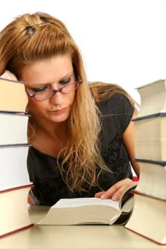 Pretty student seriously studying Stock Photos