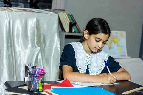 Pretty student studying in classroom Stock Photos