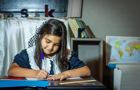 Pretty student studying in classroom Stock Photos