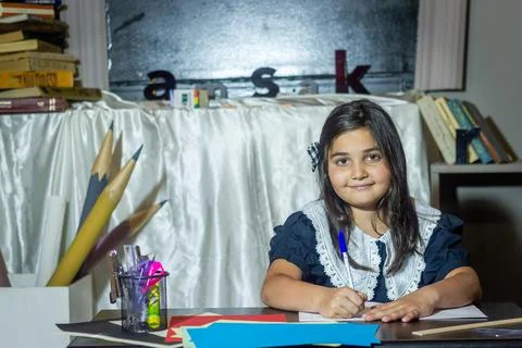 Pretty student studying in classroom Stock Photos
