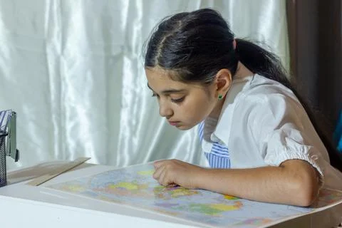 Pretty student studying in classroom Stock Photos