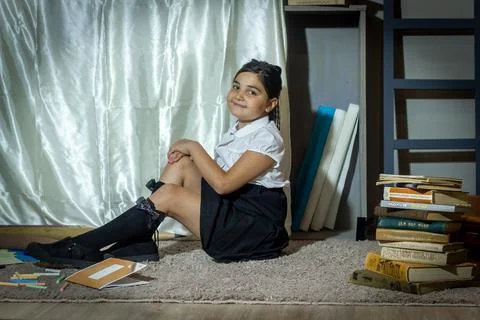 Pretty student studying in classroom Stock Photos