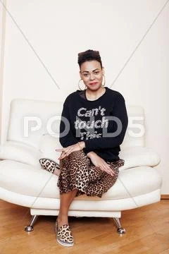 Pretty Stylish African American Big Mama Woman Well Dressed. Swag Relax At Home