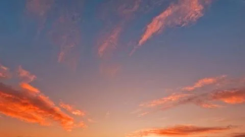 Pretty sundown gold clouds on the sky backdrop - photo of nature Stock Photos