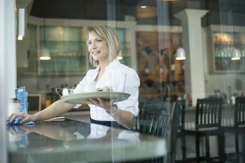 Pretty waitress working in diner Stock Photos
