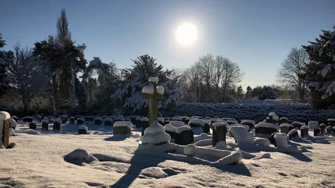 Pretty winter graveyard in deep snow Stock Footage 88916653