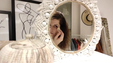 Pretty Woman Doing Makeup In Front Of Mirror 3 Stock Footage 145993208