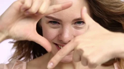 Pretty woman gesturing frame Stock-Footage 85190451