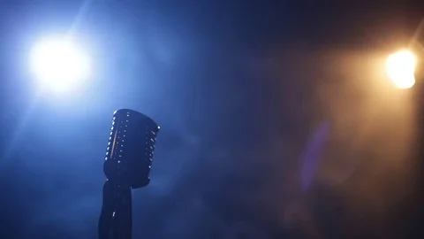 Pretty woman with mic. Loop Stock Footage 76849735