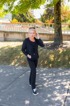 Pretty woman in a park Stock Photos