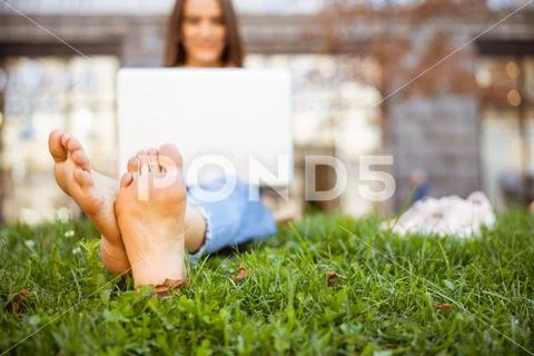 Pretty woman resting in the middle of the city Stock Photos