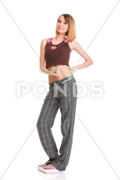 Pretty woman shows her weight loss wearing measure tapes isolated Stock Photos