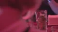 Pretty woman sitting alone in bar, drinking cocktail at party HD Footage
