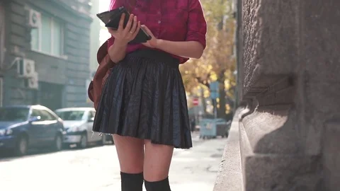 Pretty woman using tablet pc in the street Stock Footage 70461801