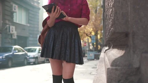 Pretty woman using tablet pc in the street Stock Footage 70516641