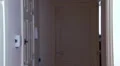 Pretty woman walks into her home HD Footage