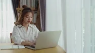Pretty Woman Working With Laptop Computer At Home Stock Footage