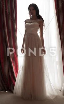 Pretty young brunette bride Stock Photos