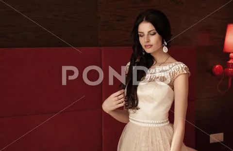 Pretty young brunette bride Stock Photos