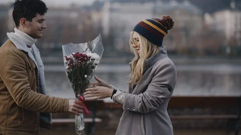 Pretty young couple dating on a city street. Love, relationship, romance concept Stock Footage 123797256
