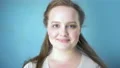 Pretty young female smiling camera, freckles skin, cosmetology, natural beauty 4k or 4k+ Resolution