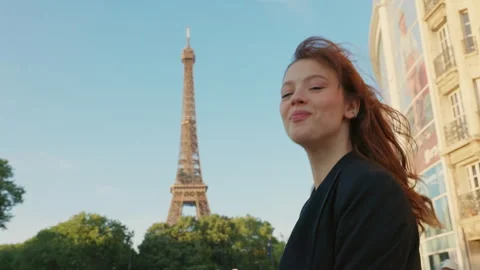 Pretty Young Girl On Background Of Eiffel Tower. Stock Footage 288709791
