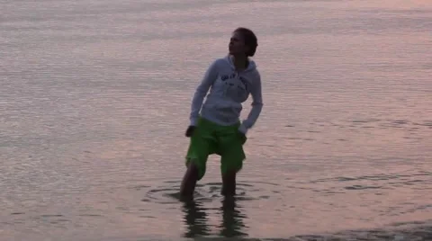 Pretty Young Girl Having Fun at Sunset Stock Footage 45883523