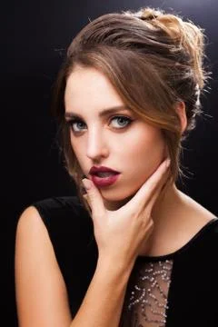 Pretty young model with elegant makeup Stock Photos
