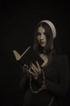 Pretty young nun Stock Photos