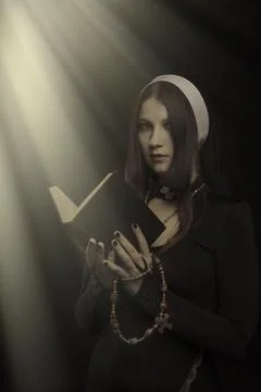 Pretty young nun Stock Photos