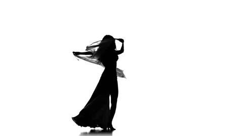 Pretty young woman continue dancing belly dance with shawl, sihouette, on white Video stock 61095407