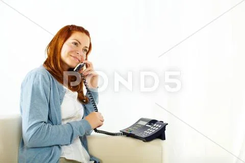 Pretty young woman on phone Stock Photos
