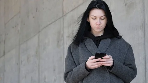 Pretty Young Woman using her Mobile Phone Stock Footage 109212267