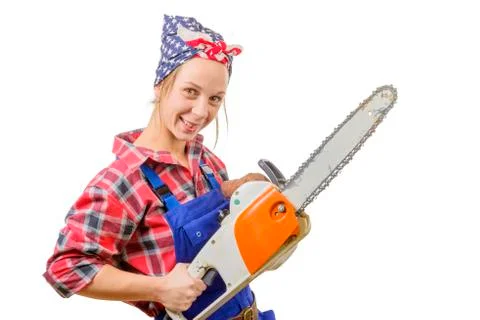 A pretty young worker with chainsaw Foto stock