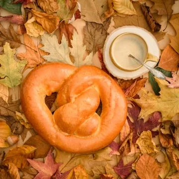 Pretzel with coffee Stock Photos