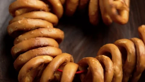 Pretzel cookies tied with red string Stock Footage 316086501